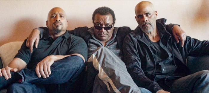 After Trevor (left) met with Ricky (center), Adrian (right) reached out and the three huddled at a show.